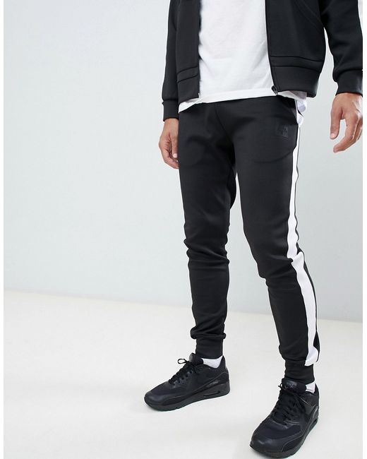 Hype skinny sweatpants in poly with side stripe