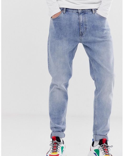 Weekday cone slim tapered jeans in