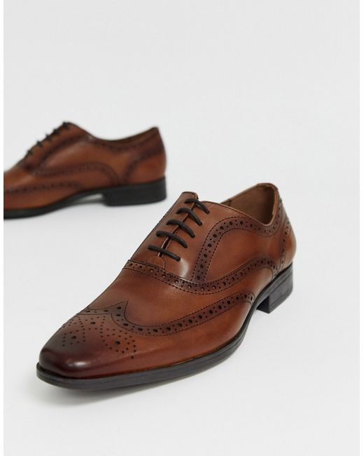 Office macro brogue in leather