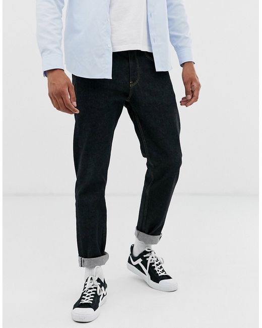 Asos Design tapered jeans in flat washed