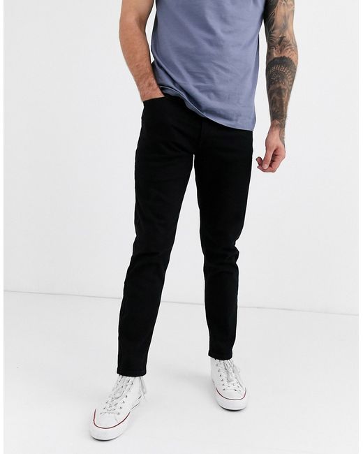 Asos Design tapered jeans in