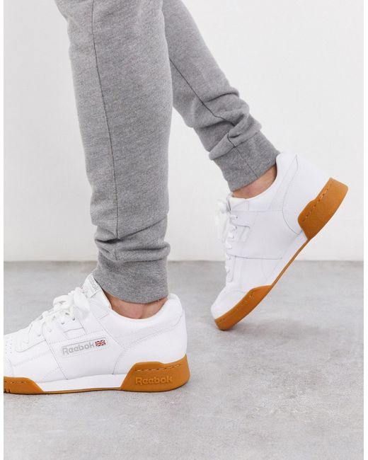 Reebok workout plus sneakers in with gum sole