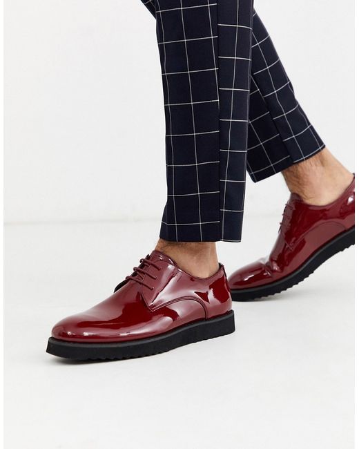 Truffle Collection brogue lace up in red-