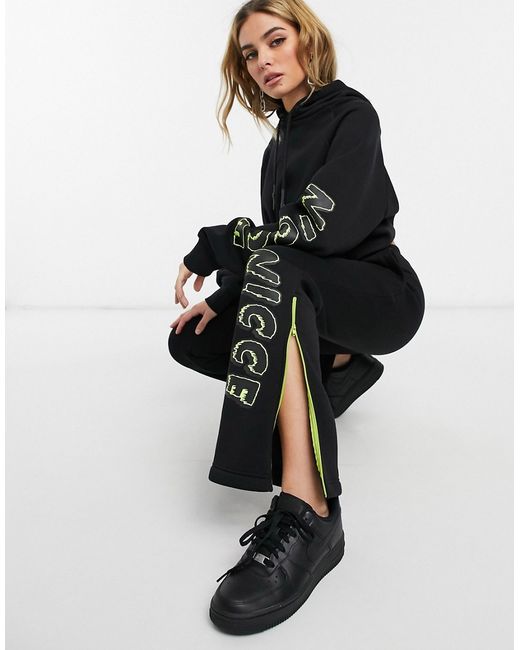 Nicce flared tracksuit bottoms with side stripe and splits two-piece-