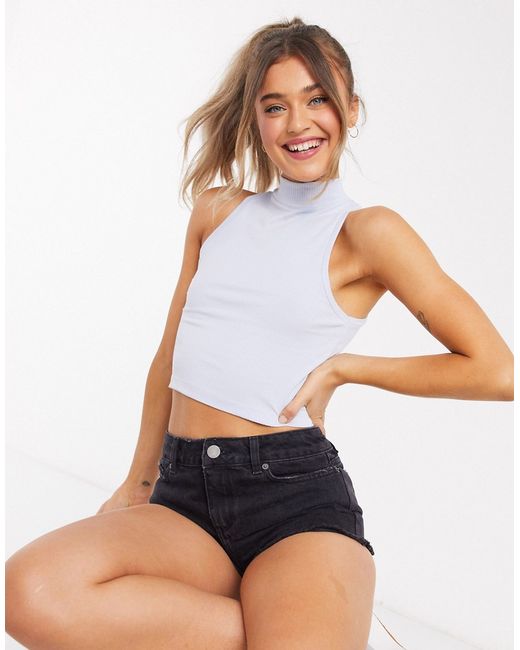 Asos Design sleeveless crop in cutabout rib with turtleneck pale
