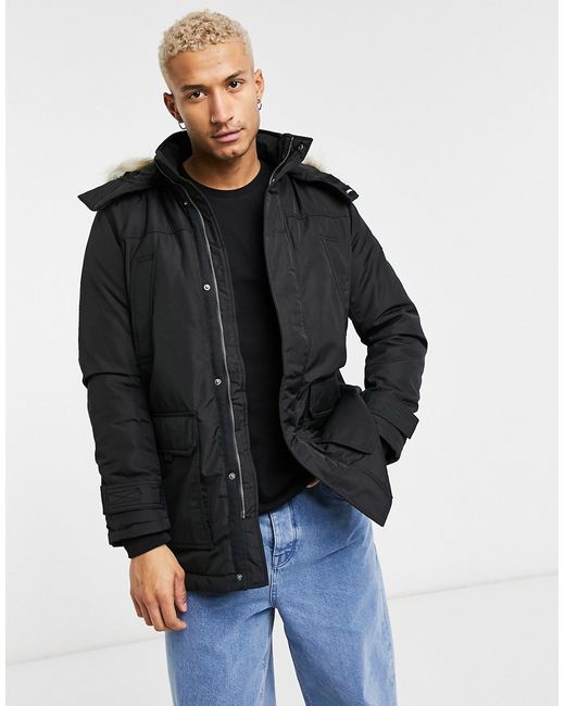 Tommy Jeans technical quilted parka in with faux fur trim