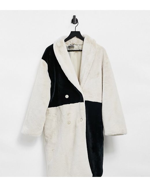Reclaimed Vintage Inspired fur coat in black and cream patchwork-