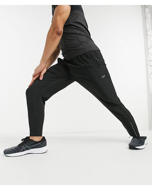 Asos 4505 woven skinny tapered running sweatpants with reflective zip detail-