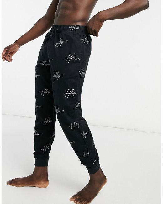 Hollister lounge sweatpants in with all over text logo