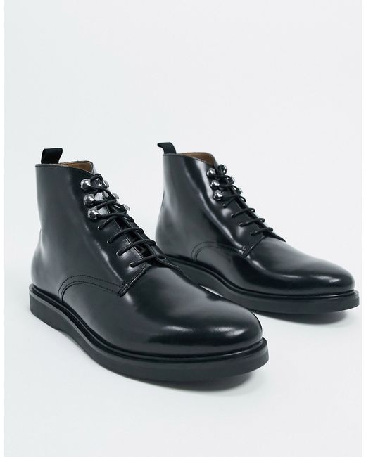 H By Hudson battle boots in high shine leather