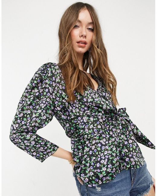 Vero Moda wrap blouse with puff sleeves and deep cuffs in purple floral-