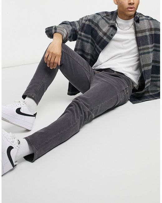 Asos Design tapered jeans in washed