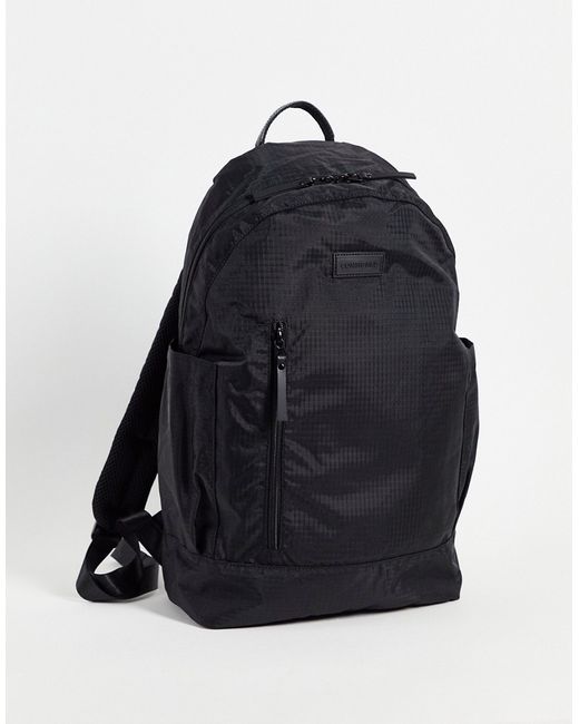 Consigned slim profile backpack-