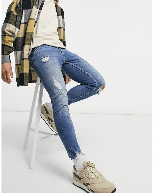 Pull & Bear premium skinny fit jeans with rips in mid wash