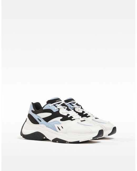 Bershka chunky sneakers in with blue detailing