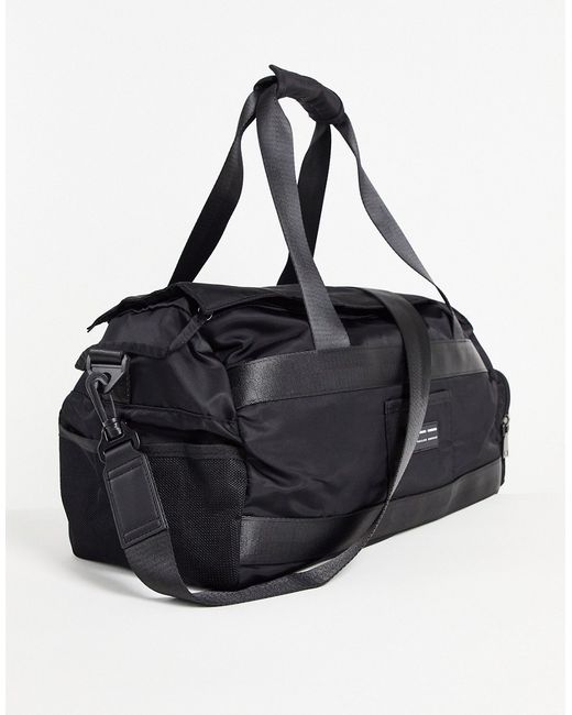 Asos Design gym carryall bag in nylon 26 Liters