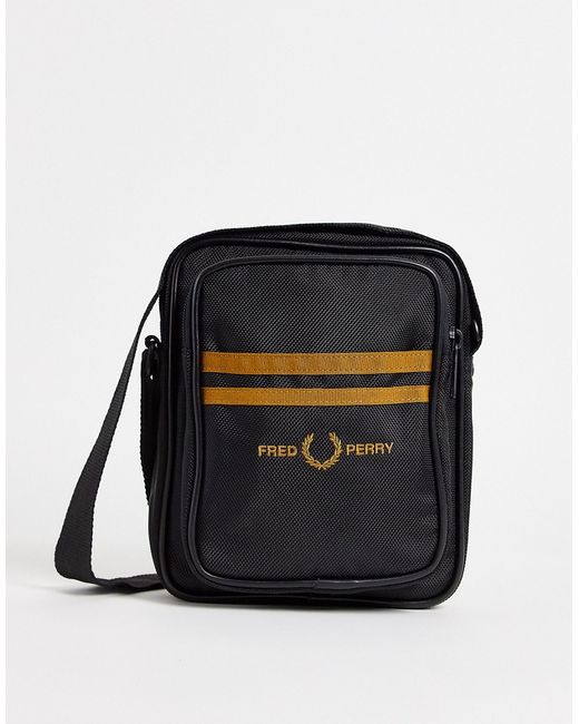 Fred Perry twin tipped x body bag in gold