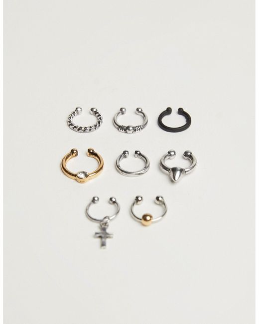 Bershka 8 pack nose rings in silver and gold-