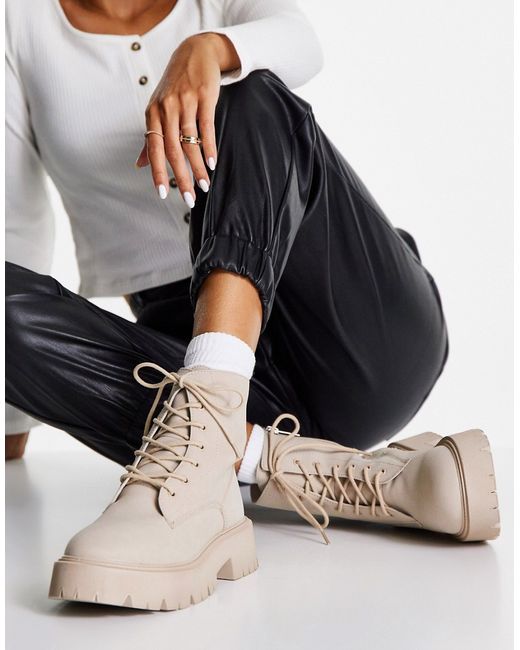 Bershka chunky lace up flat ankle boots in stone-