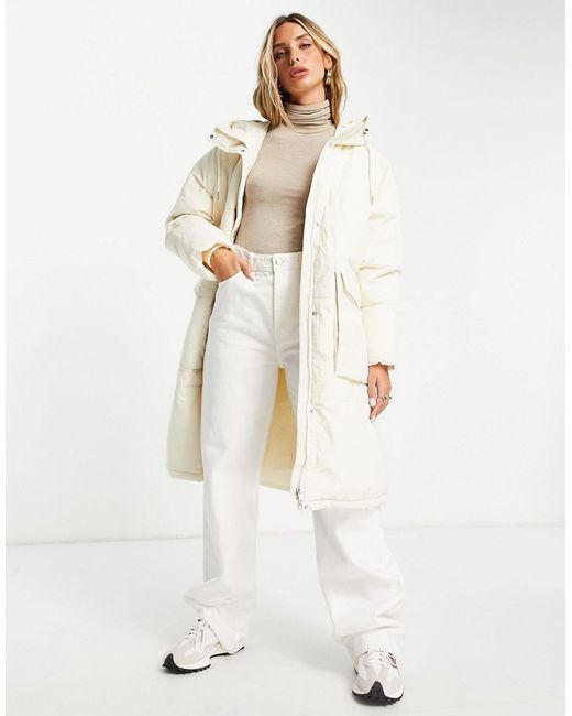 Vero Moda longline padded coat with elasticated waist in cream-