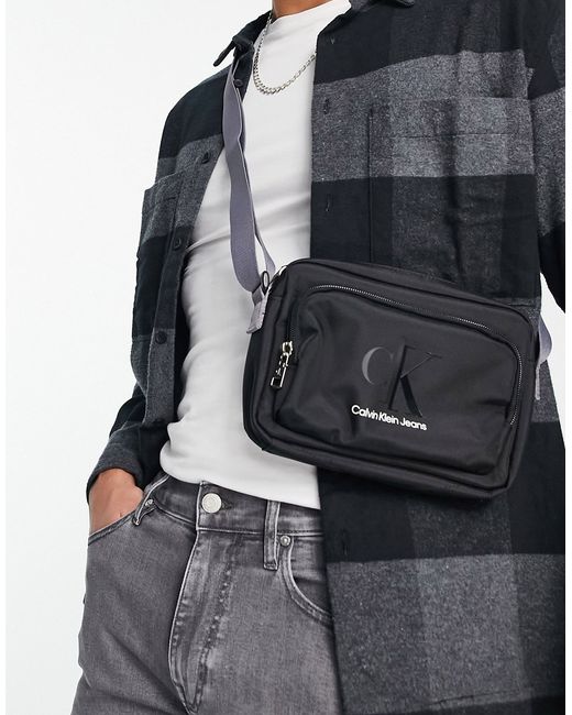 Calvin Klein Jeans monogram cross body bag in