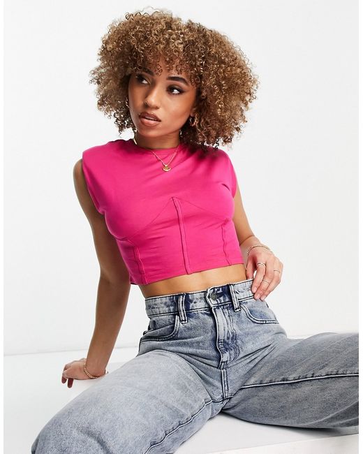 Rebellious Fashion front seam shoulder pad crop top in