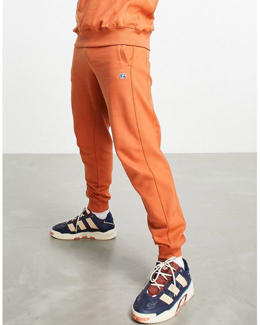 Russell Athletic Manson sweatpants in orange part of a set-