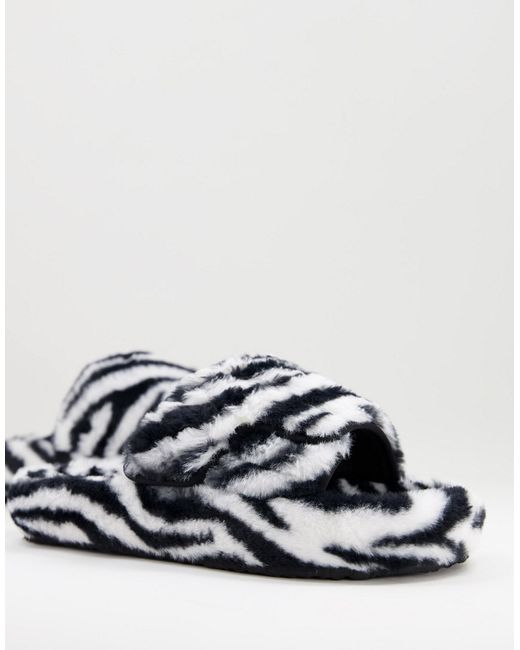 Asos Design chunky slippers in zebra faux fur-
