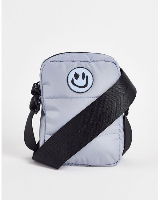 Asos Design padded cross body bag with smile badge in