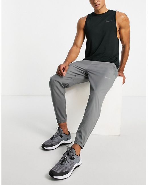 Nike Running Dri-FIT Challenger woven pants in