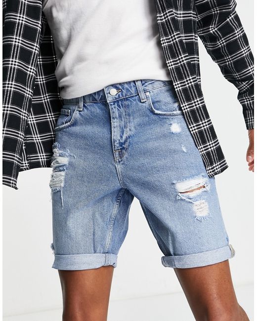 Asos Design slim denim shorts in mid wash with rips