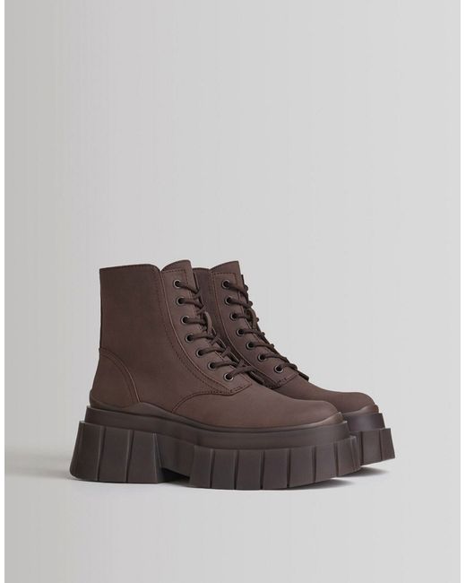 Bershka chunky lace up flat boot in chocolate with tonal sole-