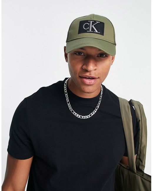 Calvin Klein Jeans explorer trucker cap in khaki-