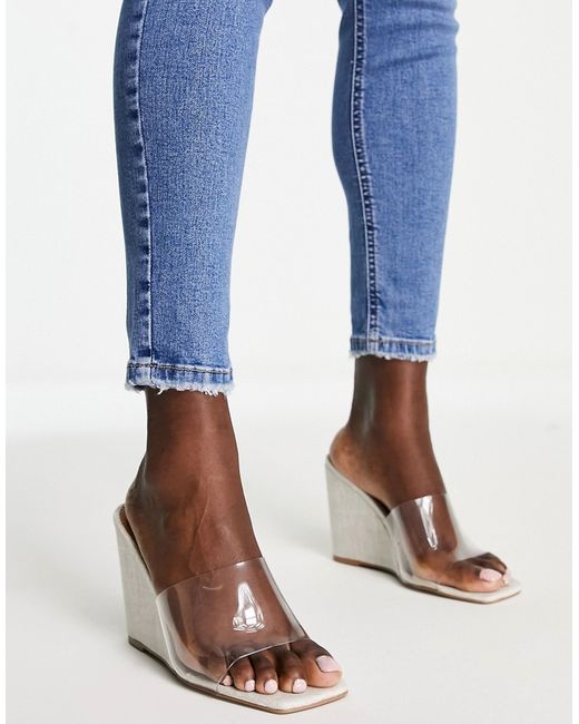 Asos Design True high wedge mules in clear and natural-