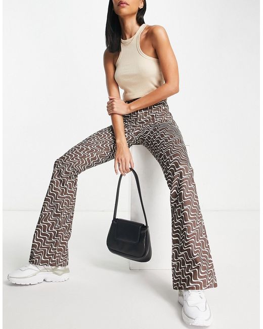 Asos Design puddle flare pants in chocolate wavy print-