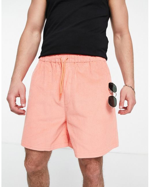 Asos Design cord slim shorts with cargo pockets in pink-