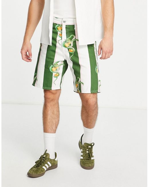 Jack & Jones Premium denim shorts in green stripe with snake print-