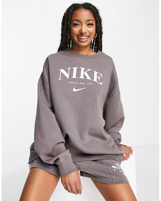 Nike Collegiate logo oversized fleece crew neck sweatshirt in