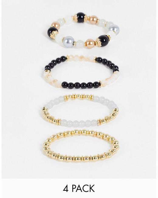 Madein. Madein 4 pack of beaded bracelets in gold and black-