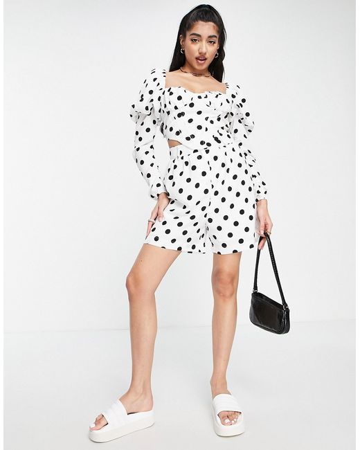 The Frolic polka dot smock crop blouse in black and part of a set