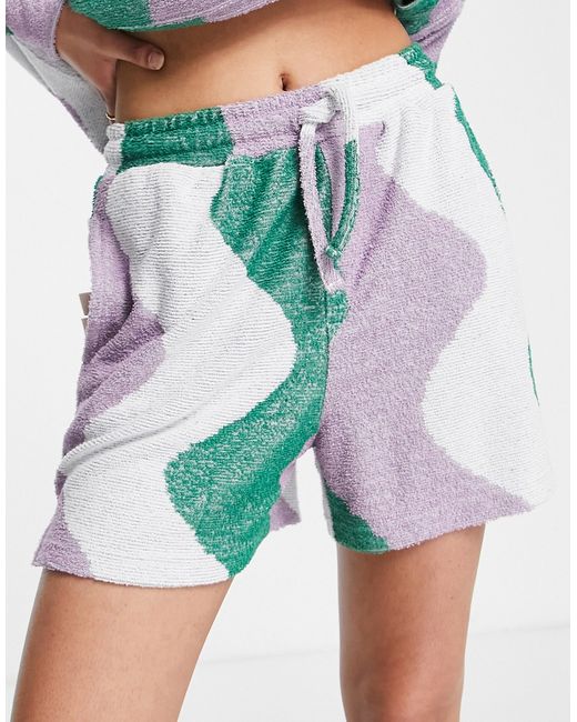 Damson Madder wave print towelling shorts in green part of a set-