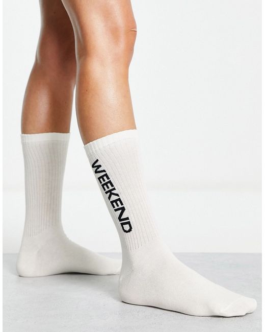 ASOS Weekend Collective calf length rib socks with horizontal split logo in