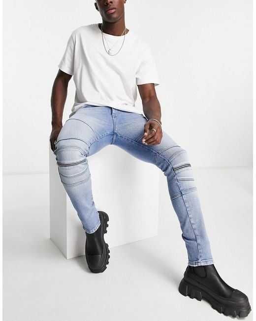Asos Design skinny jeans in mid wash with knee zip moto detail-