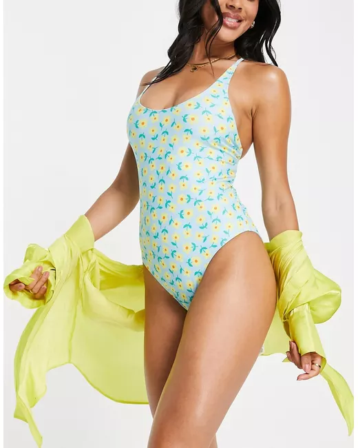 Urban Threads cross back swimsuit in light and yellow ditsy floral print