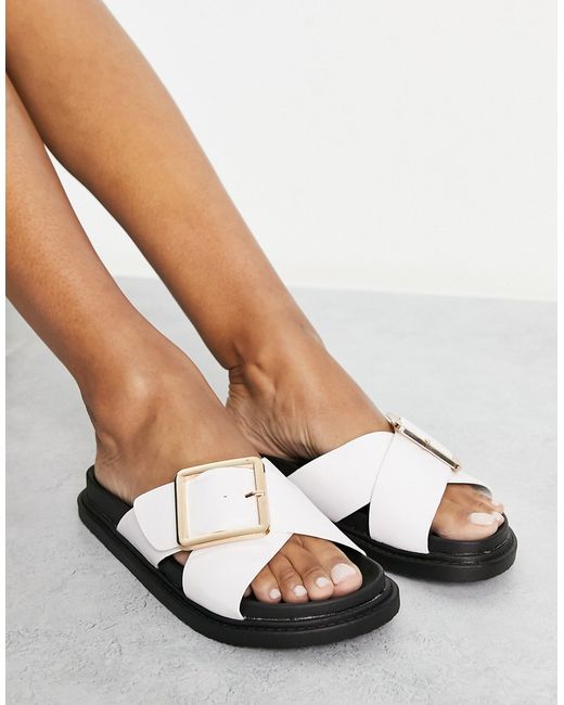 Truffle Collection buckle flat sandals in