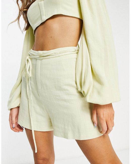 Asos Design linen high waisted shorts with tie detail in lime part of a set-