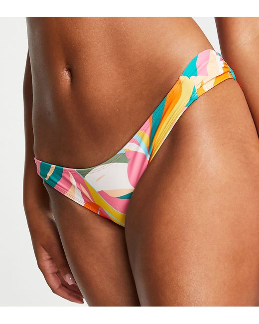 Accessorize bikini bottom in tropical print