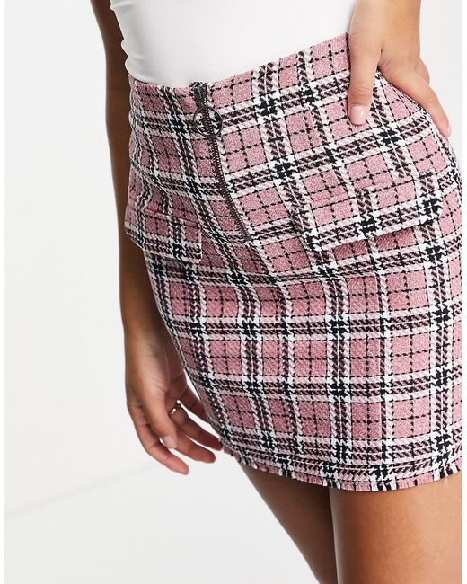 Asos Design boucle mini skirt with raw hem and pocket detail in pink check print-