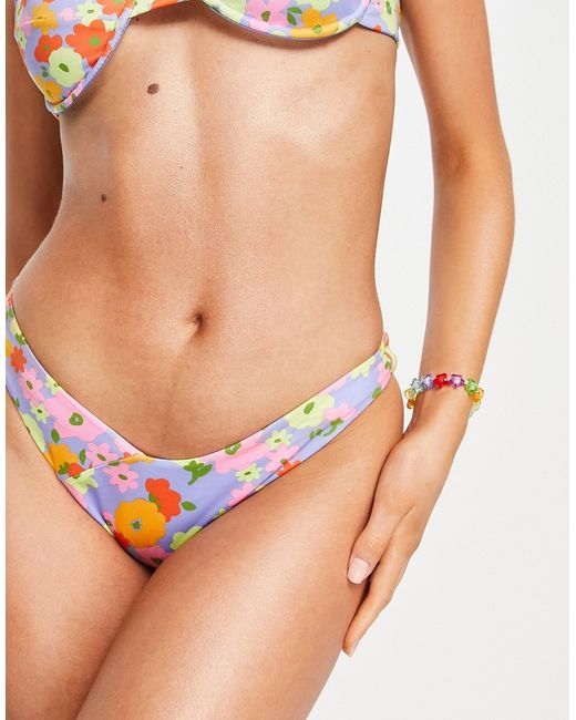 Bershka bold floral print thong bikini bottom in