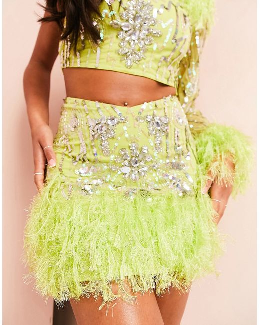 ASOS Luxe mini skirt with gemstone embellishment and faux feather trim in lime part of a set-